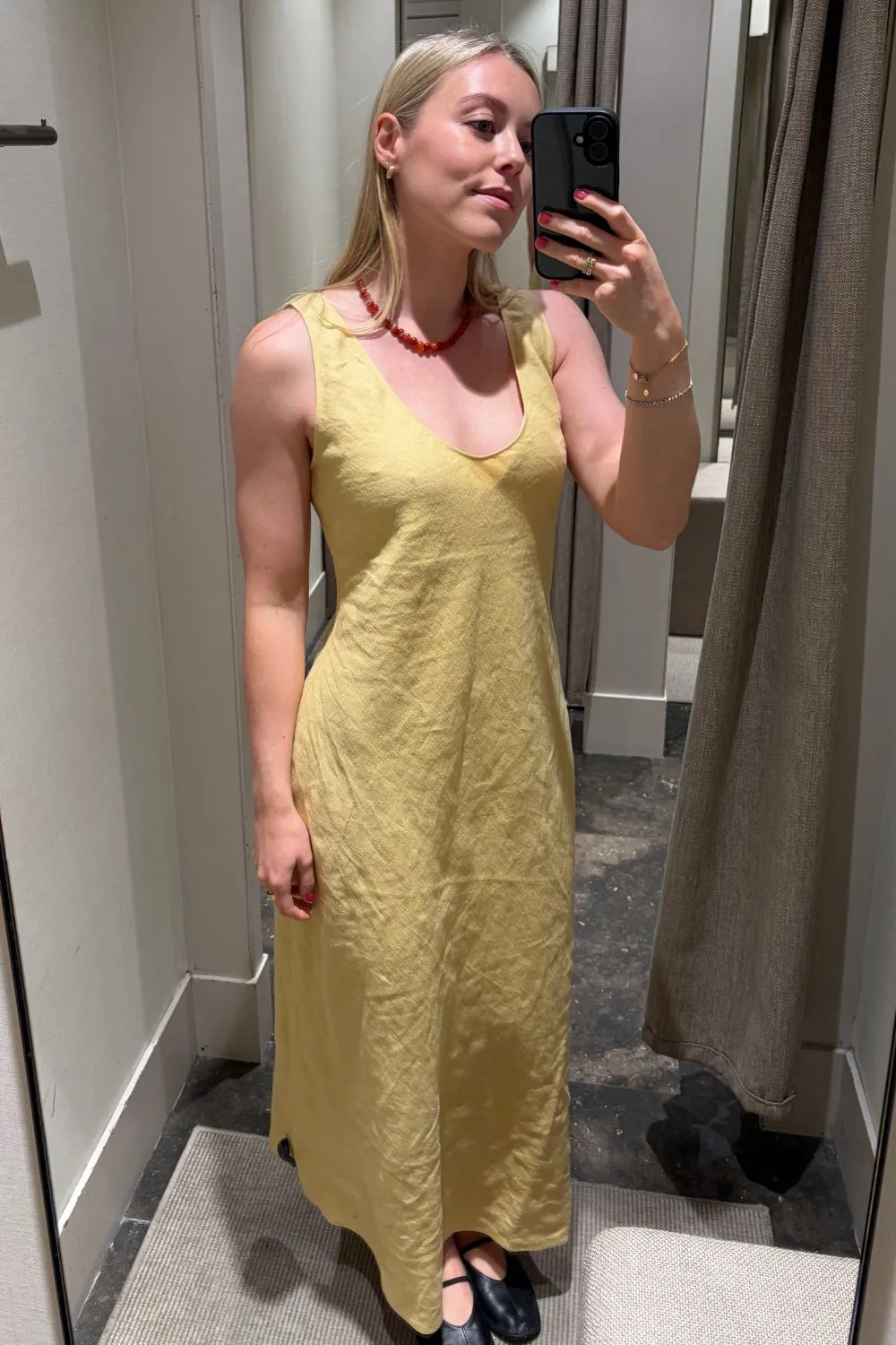Florrie wears the&nbsp;Massimo Dutti 100% Linen Strappy Midi Dress (&pound;100)