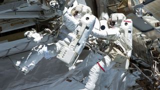 Astronauts Chris Cassidy and Tom Marshburn complete a spacewalk.