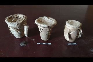 These three ceramic vessels were found beside the animal sacrifices in the cemetery. They were likely used in a funerary offering, archaeologists believe.