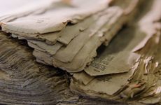 crumbling newspaper corners