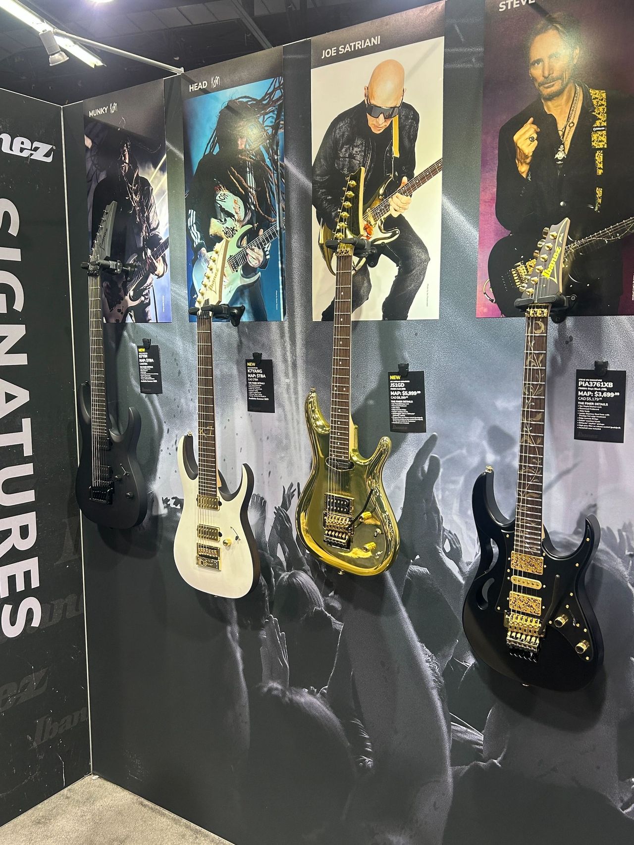 Seven of the guitars on display at Ibanez's booth at the 2025 NAMM Show in Anaheim, California