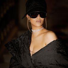 Rihanna shot for Dior J'adore, wearing black sunglasses