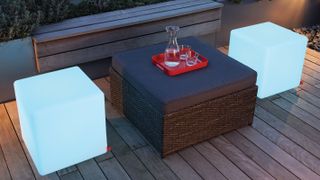 illuminated seating cubes on decking