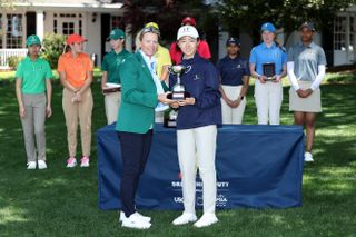 Annika Sorenstam hands out a trophy at the 2024 Drive, Chip and Putt Championship