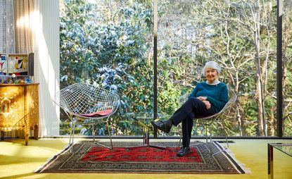 Cornelia Hahn Oberlander in 2018, sitting on a Harry Bertoia ‘Diamond’ chair in her Vancouver home, located in the University Endowment Lands, a semi-forested area west of the city