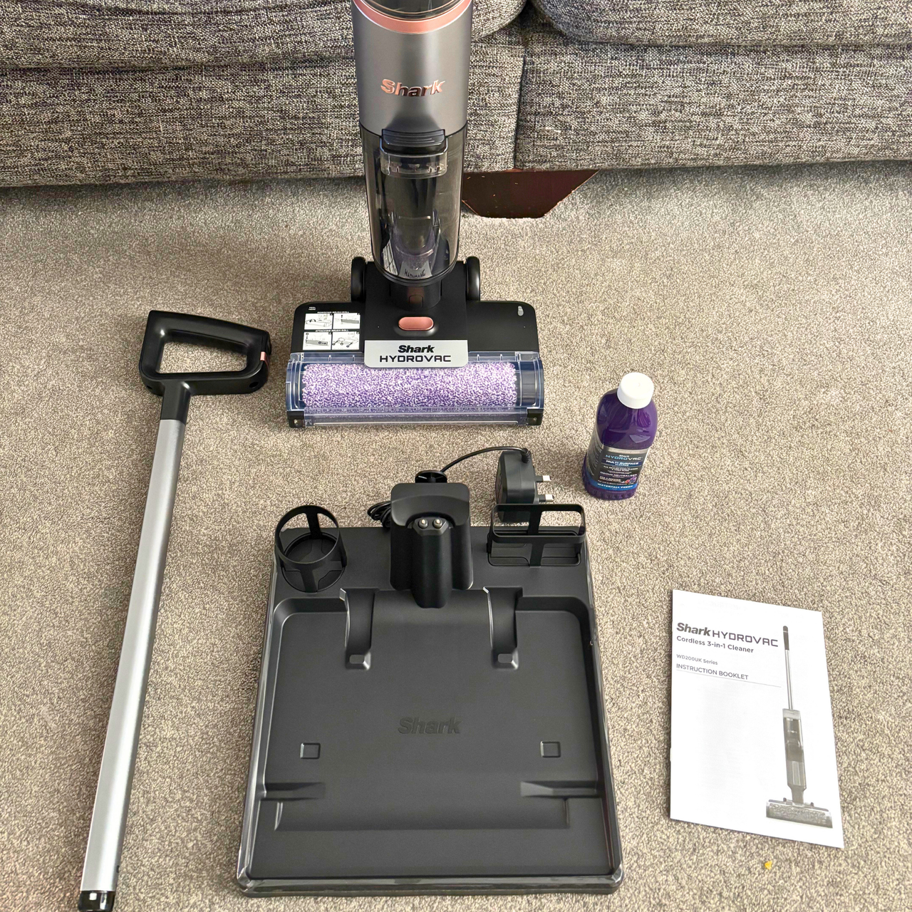 Flat lay of Shark HydroVac Cordless Hard Floor Cleaner contents