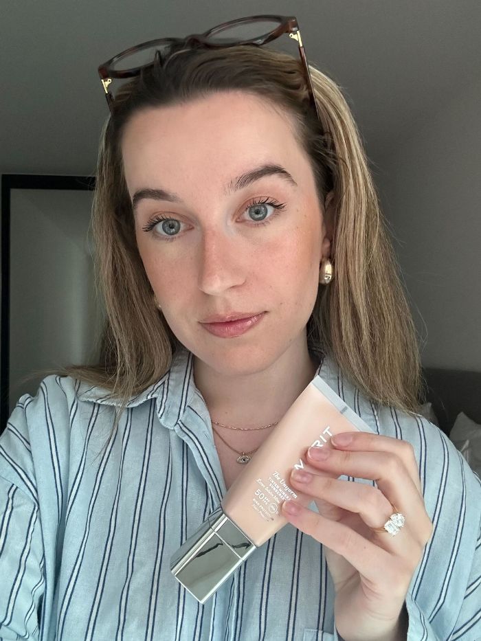 Junior beauty editor Grace Lindsay testing the Merit The Uniform Tinted SPF 50