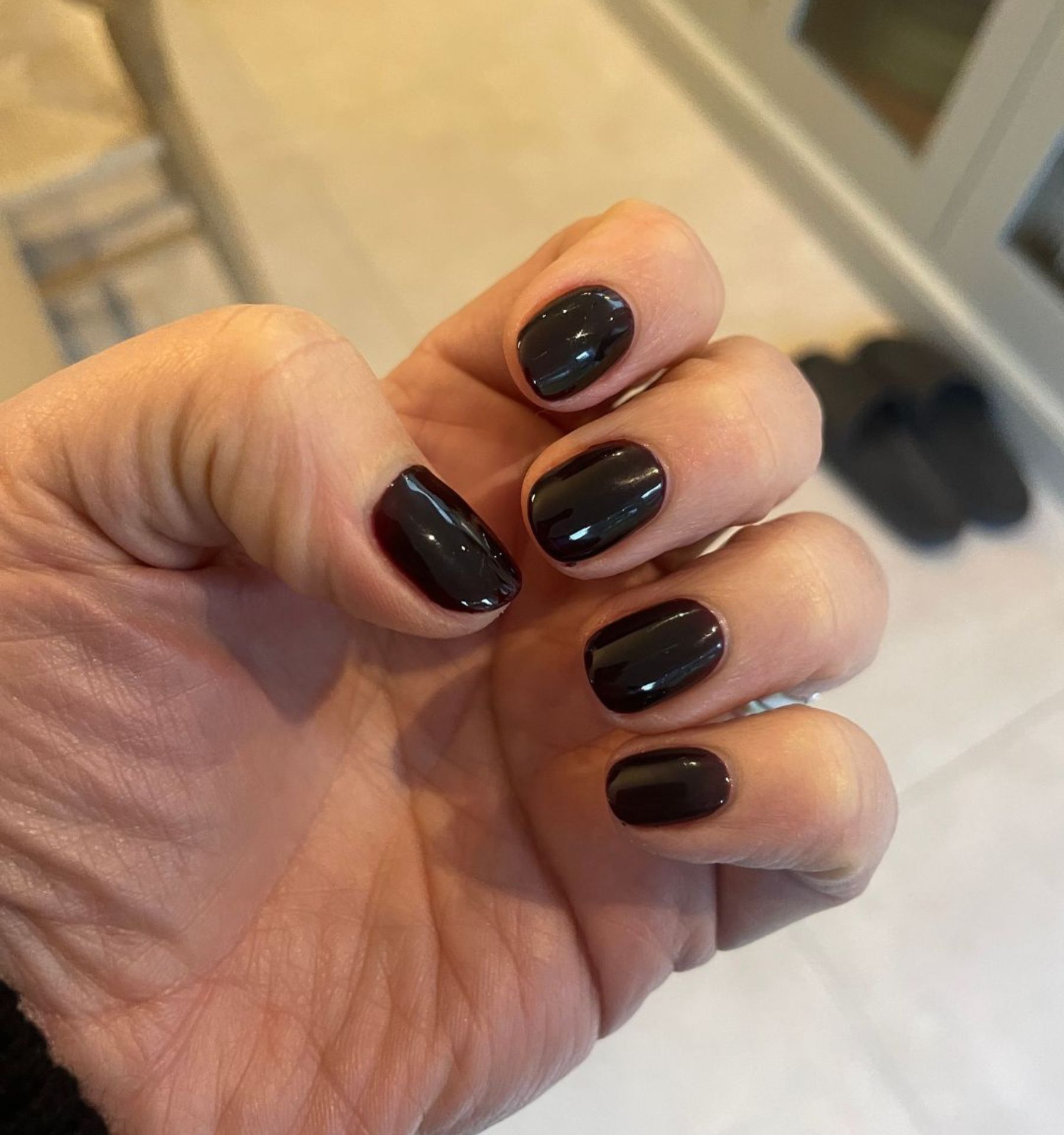 an image of Sarah's plum nail polish using Nails Inc