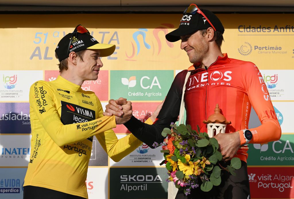 MALHAO PORTUGAL FEBRUARY 23 LR Race winner Jonas Vingegaard of Denmark and Team Visma Lease a Bike Yellow leader jersey and Laurens De Plus of Belgium and Team INEOS Grenadiers on third place on the podium ceremony after the 51st Volta ao Algarve em Bicicleta Stage 5 a 196 individual time trial stage from Salir to Malhao 477m on February 23 2025 in Malhao Portugal Photo by Tim de WaeleGetty Images