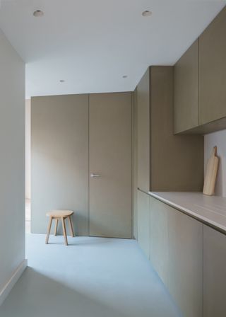 minimalist kitchen and living space in lloyd eist house in south london