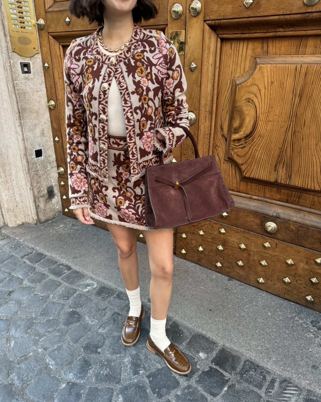 April Lockhart wearing a unique sweater in winter 2025