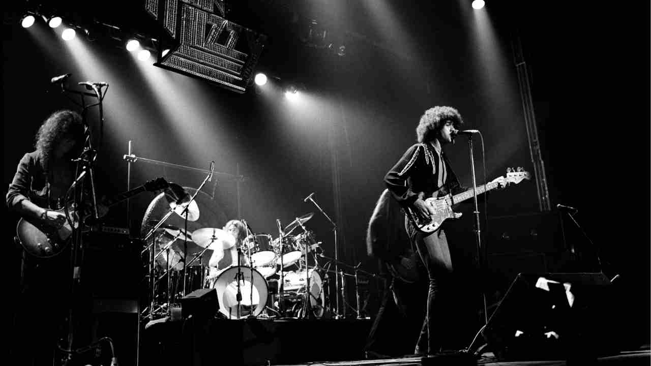 Thin Lizzy performing onstage in the 1970s