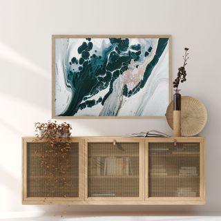 Sideboard with canework detailing and abstract artwork