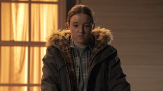 Ellie standing on porch in The Last of Us Season 2