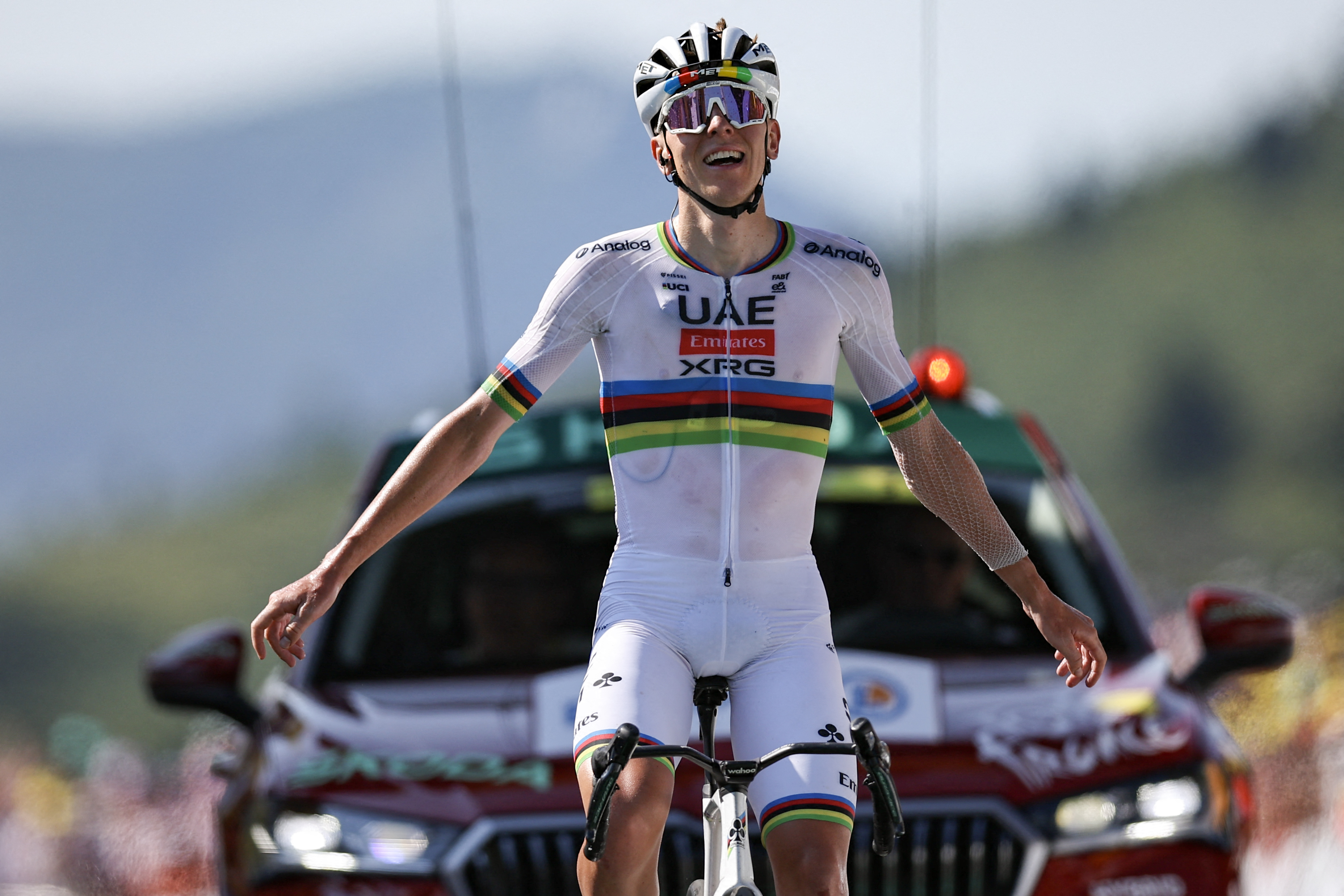 UAE Team Emirates - XRG team&#039;s Slovenian rider Tadej Pogacar cycles to the finish line to win the 12th stage of the 112th edition of the Tour de France cycling race, 180.6 km between Auch and Hautacam, in the Pyrenees mountains of southwestern France, on July 17, 2025. (Photo by Anne-Christine POUJOULAT / AFP)