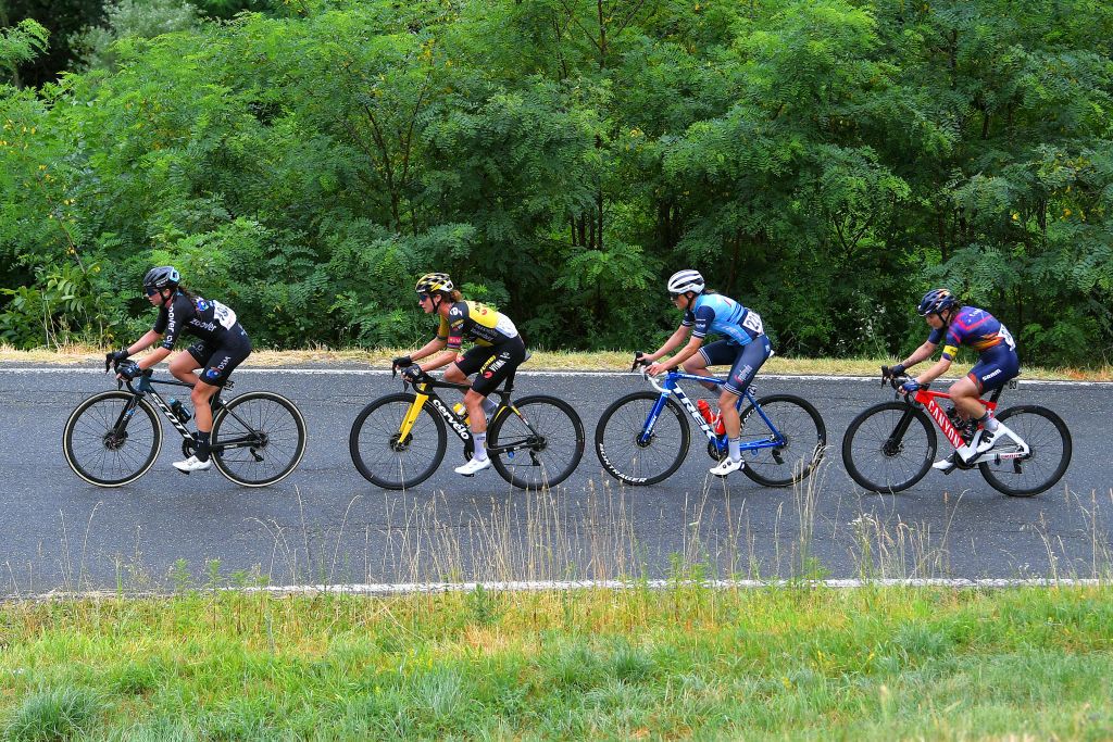 OVADA ITALY JULY 04 Marianne Vos of Netherlands and Jumbo Visma Team Liane Lippert of Germany and Team DSM Lucinda Brand of Netherlands and Team Trek Segafredo Elise Chabbey of Switzerland and Canyon SRAM Racing Team in breakaway during the 32nd Giro dItalia Internazionale Femminile 2021 Stage 3 a 135km stage from Casale Monferrato to Ovada GiroDonne UCIWWT on July 04 2021 in Ovada Italy Photo by Luc ClaessenGetty Images