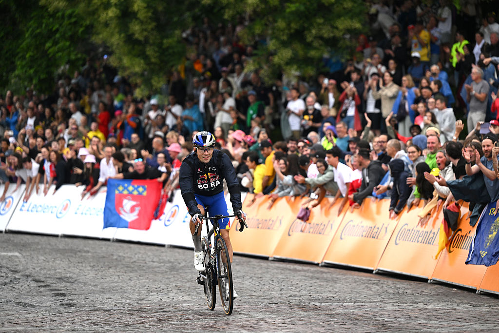 PARIS - CHAMPS-ELYSEES, FRANCE - JULY 27: Primoz Roglic of Slovenia and Team Red Bull - BORA - hansgrohe passing the Cote de la Butte Montmatre while fans cheers during the 112th Tour de France 2025, Stage 21 a 132.3km stage from Mantes-la-Ville to Paris - Champs-Elysees / #UCIWT / on July 27, 2025 in Paris - Champs-Elysees, France. (Photo by Dario Belingheri/Getty Images)