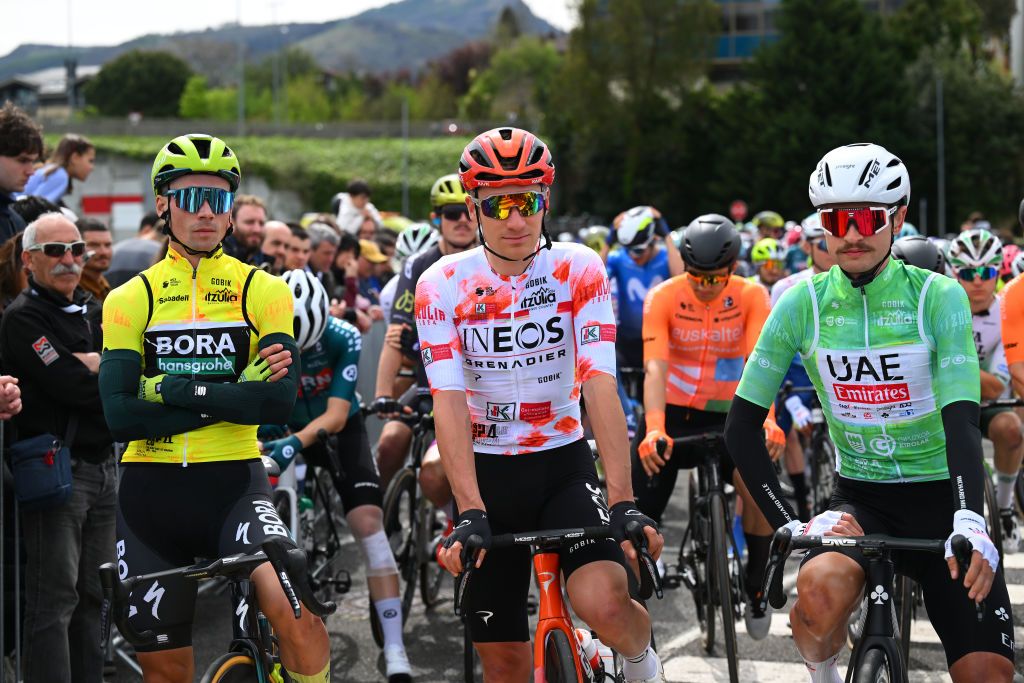 IRUN SPAIN APRIL 02 LR Primoz Roglic of Slovenia and Team BORA hansgrohe Yellow Leader Jersey Ethan Hayter of The United Kingdom and Team INEOS Grenadiers Polka Dot Mountain Jersey and Jay Vine of Australia and UAE Team Emirates Green Points Jersey prior to the 63rd Itzulia Basque Country 2024 Stage 2 a 160km stage from Irun to Kanbo UCIWWT on April 02 2024 in Irun Spain Photo by Tim de WaeleGetty Images