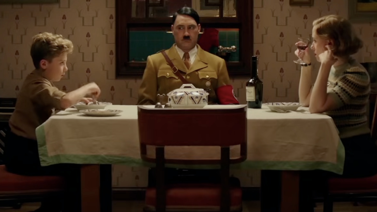 Jojo, "Hitler", and Rosie at the dinner table.