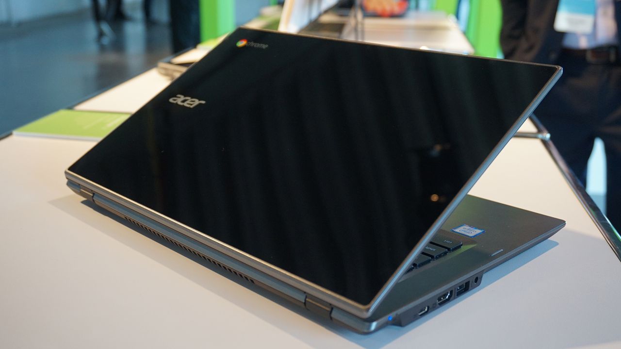 The Acer Chromebook 14 for Work from the rear with the lid half-closed