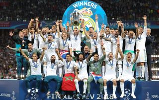 Real Madrid lift the Champions League trophy after winning the 2017/18 Champions League
