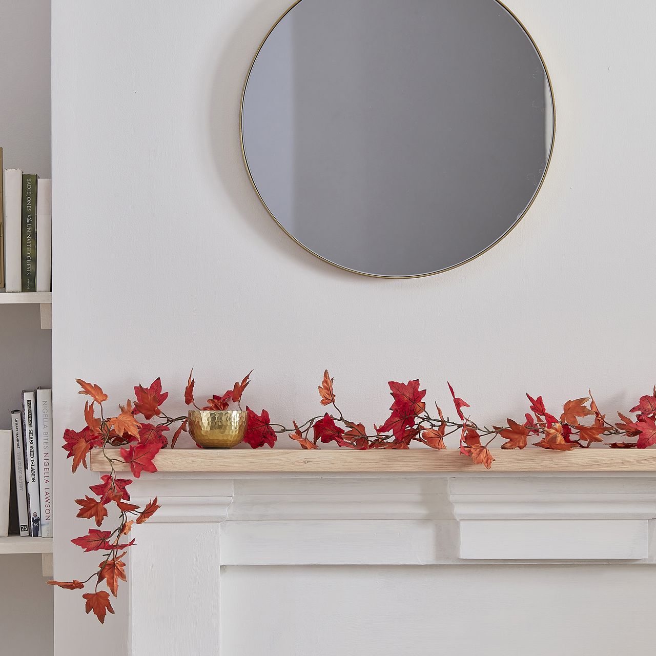fall leaf garland on mantle piece