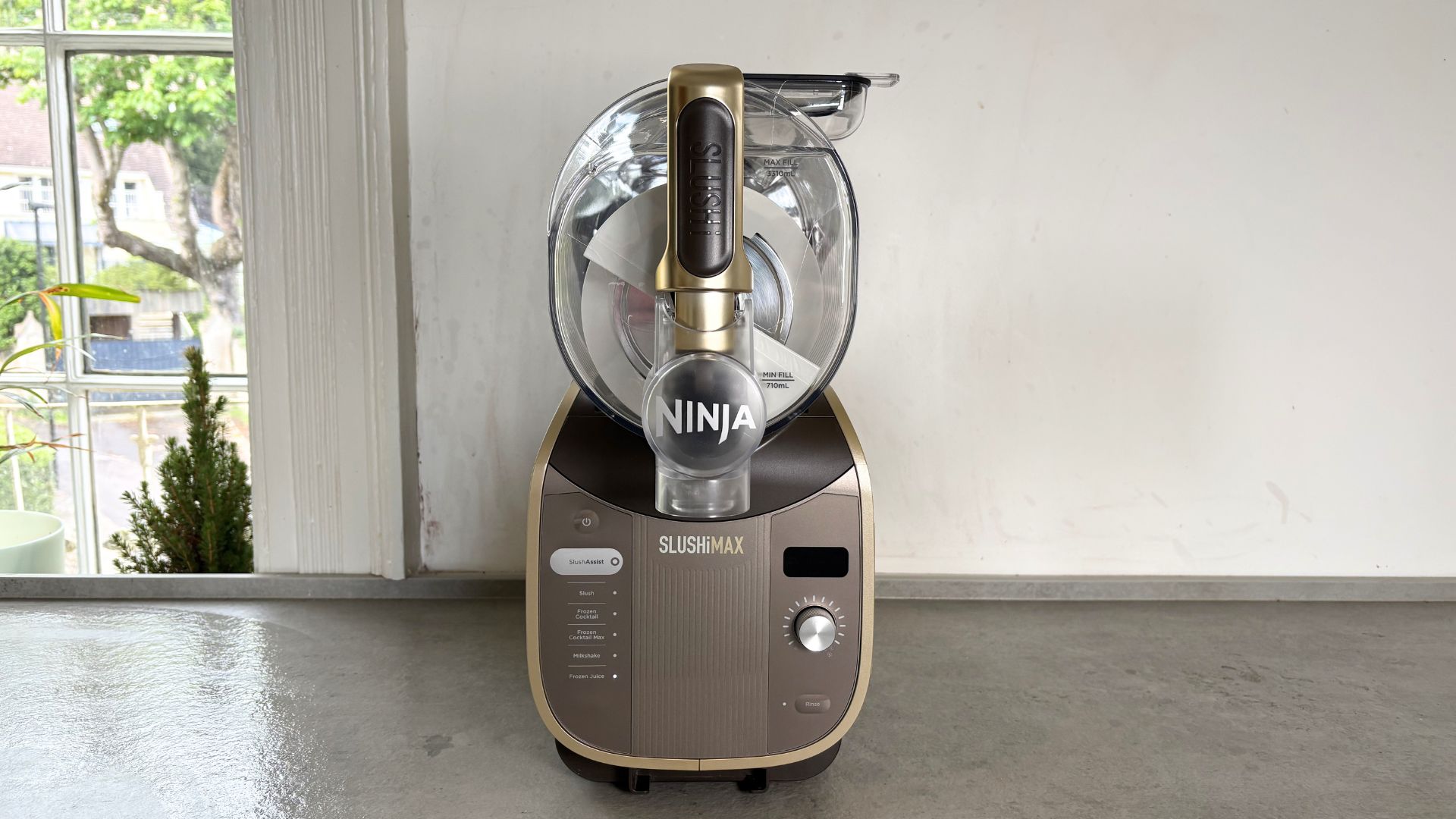 Ninja Slushi Max Frozen Drinks Maker on the counter