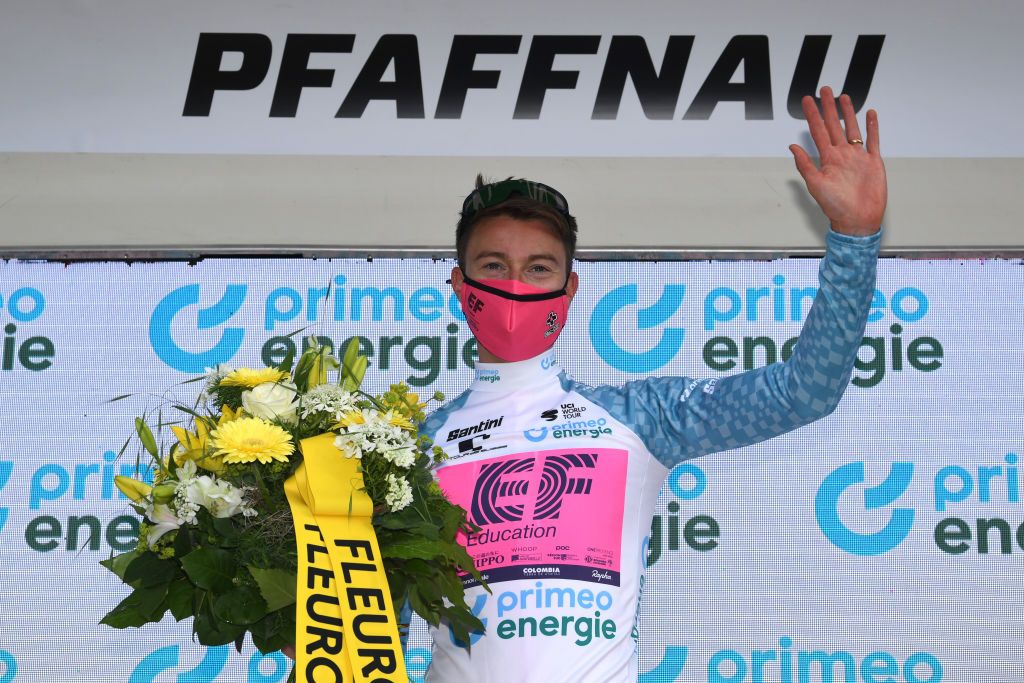 PFAFFNAU SWITZERLAND JUNE 08 Neilson Powless of United States and Team EF Education Nippo White Best Young Rider Jersey celebrates at podium during the 84th Tour de Suisse 2021 Stage 3 a 185km stage from Lachen to Pfaffnau 509m UCIworldtour tds tourdesuisse on June 08 2021 in Pfaffnau Switzerland Photo by Tim de WaeleGetty Images