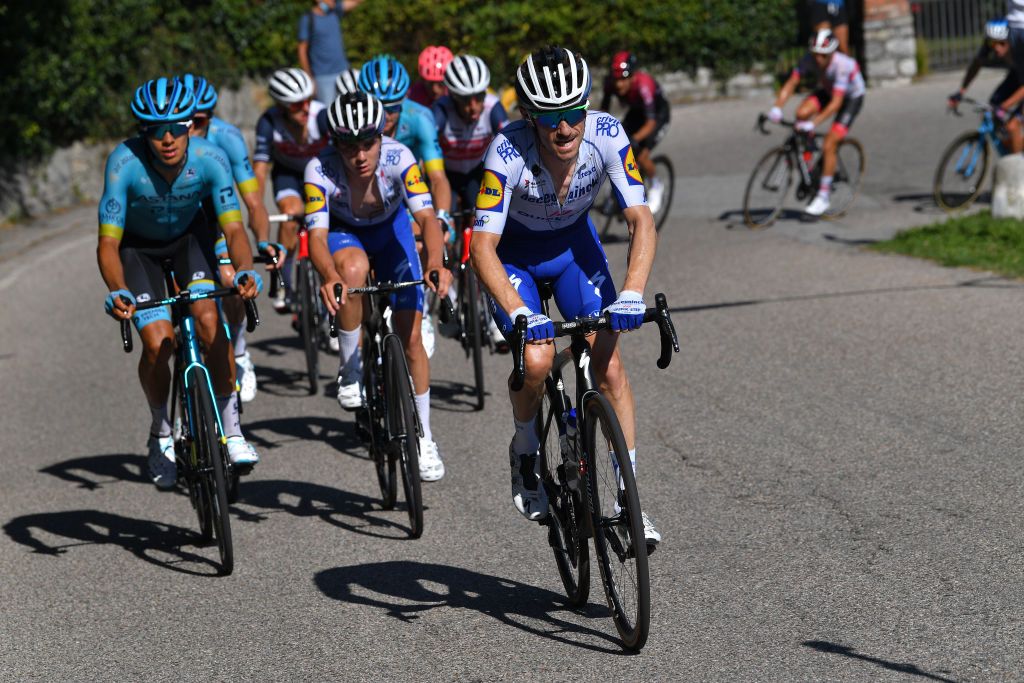 COMO ITALY AUGUST 15 Harold Tejada Canacue of Colombia and Astana Pro Team Remco Evenepoel of Belgium and Team Deceuninck QuickStep Dries Devenyns of Belgium and Team Deceuninck QuickStep during the 114th Il Lombardia 2020 a 231km race from Bergamo to Como ilombardia IlLombardia on August 15 2020 in Como Italy Photo by Tim de WaeleGetty Images