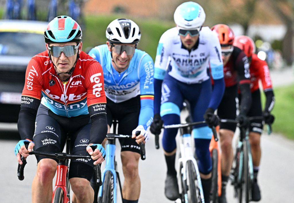 Lotto Dstny's Belgian cyclist Jasper De Buyst (L) competes during the Kuurne-Brussels-Kuurne one day cycling race, 196,4 km from Kuurne to Kuurne via Brussels, in Kortrijk on February 25, 2024. (Photo by JASPER JACOBS / Belga / AFP) / Belgium OUT