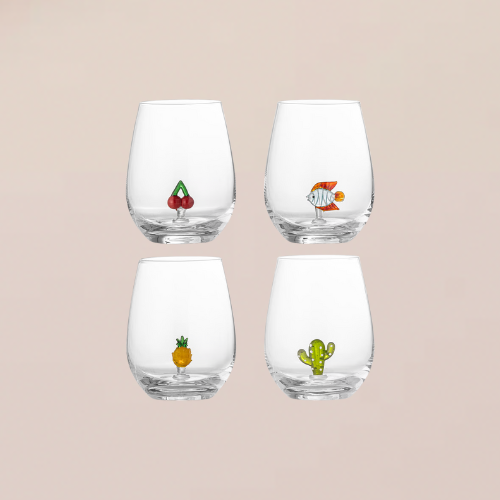 Four glass tumblers with novelty glass figurines inside