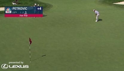 Tim Petrovic putts on the green
