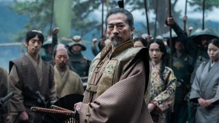 Hiroyuki Sanada as Yoshii Toronaga, standing in front of his liege lords and ladies, in 'Shogun'