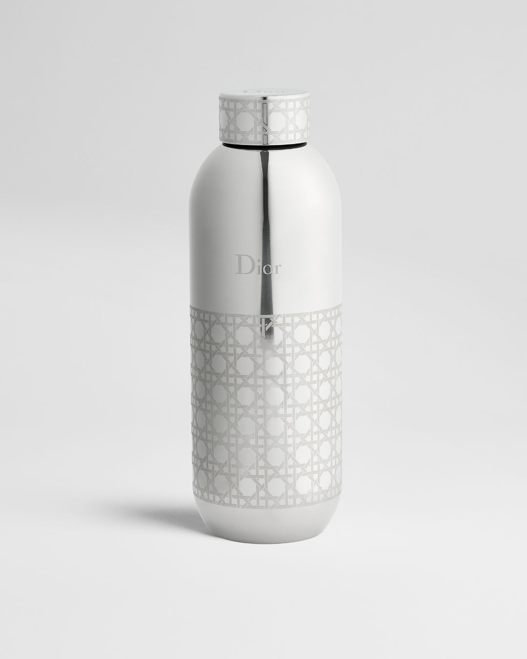 Silver water bottle with Dior logo.