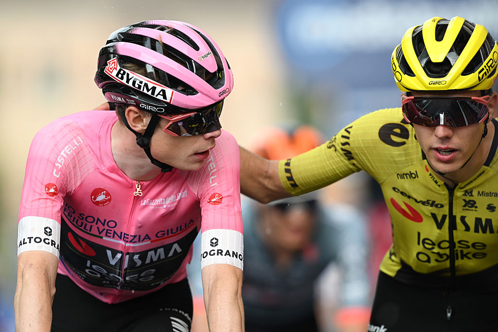PIEVE DI SOLIGO, ITALY - MAY 28: (L-R) Jonas Vingegaard of Denmark - Pink Leader Jersey and Davide Piganzoli of Italy and Team Visma | Lease a Bike cross the finish line during the 109th Giro d&amp;amp;apos;Italia 2026, Stage 18 a 171km stage from Fai della Paganella to Pieve di Soligo / #UCIWT / on May 28, 2026 in Pieve di Soligo, Italy. (Photo by Dario Belingheri/Getty Images)