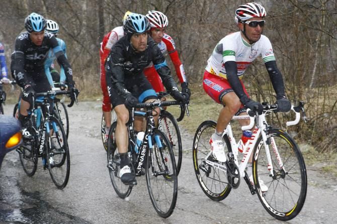 Catalunya leader Joaquim Rodriguez (Katusha) climbs to the Vallter 2000 summit finish in cold, miserable conditions