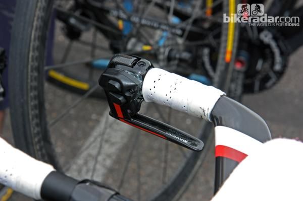 Garmin-Sharp team time trial bikes feature modified Shimano Dura-Ace Di2 shifter pods that are glued on to the Magura hydraulic brake levers.