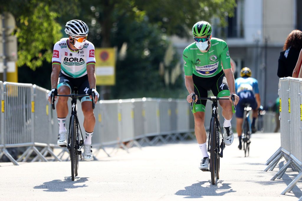 MERIBEL FRANCE SEPTEMBER 16 Start Peter Sagan of Slovakia and Team Bora Hansgrohe Sam Bennett of Ireland and Team Deceuninck QuickStep Green Points Jersey Mask Covid safety measures Team Presentation during the 107th Tour de France 2020 Stage 17 a 170km stage from Grenoble to Mribel Col de la Loze 2304m TDF2020 LeTour on September 16 2020 in Mribel France Photo by Michael SteeleGetty Images