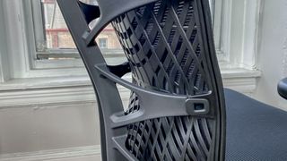 A close-up of the lumbar support section of the Autonomous Ergochair Ultra's backrest