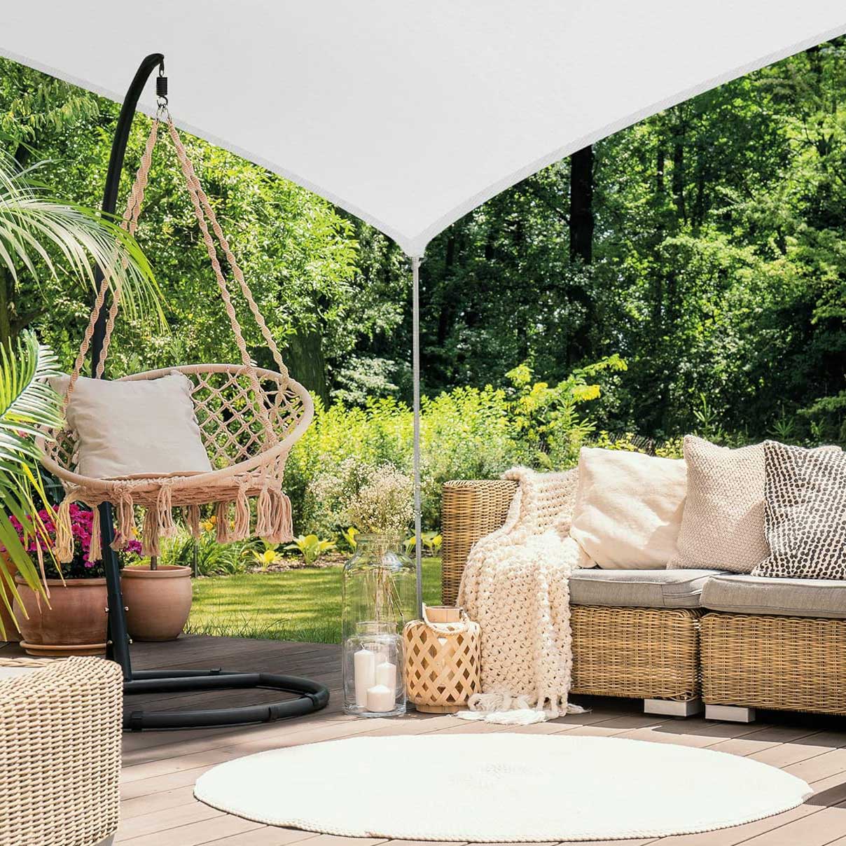 white shade sail over a patio area 