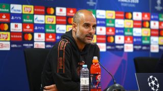 LISBON, PORTUGAL - AUGUST 14: In this UEFA handout picture Pep Guardiola, Manager of Manchester City speaks to the media during the Manchester City press conference ahead of the UEFA Champions League Quarter Final match between Manchester City and Olympique Lyonnais at Estadio Jose Alvalade on August 14, 2020 in Lisbon, Portugal.