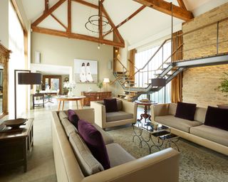 huge living room with Italian stone flooring, carrara marble and solid oak windows and doors