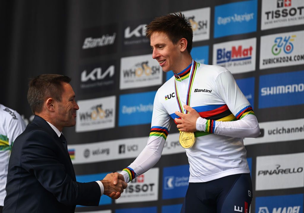 ZURICH SWITZERLAND SEPTEMBER 29 LR David Lappartient President of the UCI World Tour and the gold medalist Tadej Pogacar of Team Slovenia on the podium during the 97th UCI Cycling World Championships Zurich 2024 Mens Elite Road Race a 2739km one day race from Winterthur to Zurich on September 29 2024 in Zurich Switzerland Photo by Dario BelingheriGetty Images