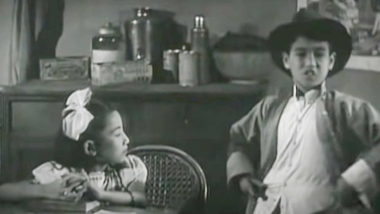 Bruce Lee (right) in The Kid.