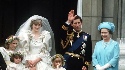 The Prince and Princess of Wales pose on the balcony of Buckingham Palace on their wedding day, with the Queen and some of the bridesmaids, 29th July 1981. (Photo by Terry Fincher/Princess Diana Archive/Getty Images)