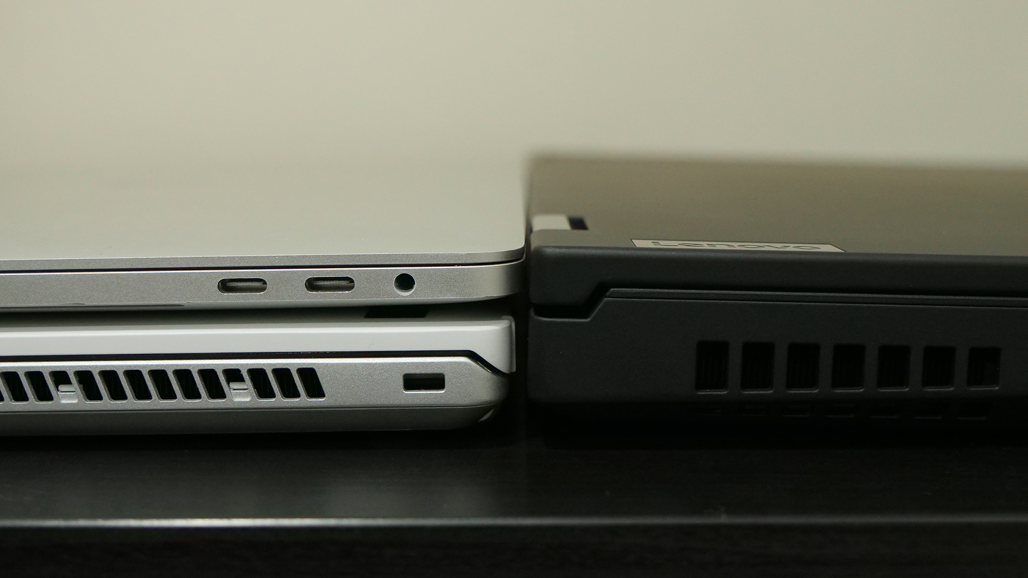 Lenovo ThinkPad P15 with MacBook Pro (2016) and Asus Zephyrus G14 (2020) stacked next to it