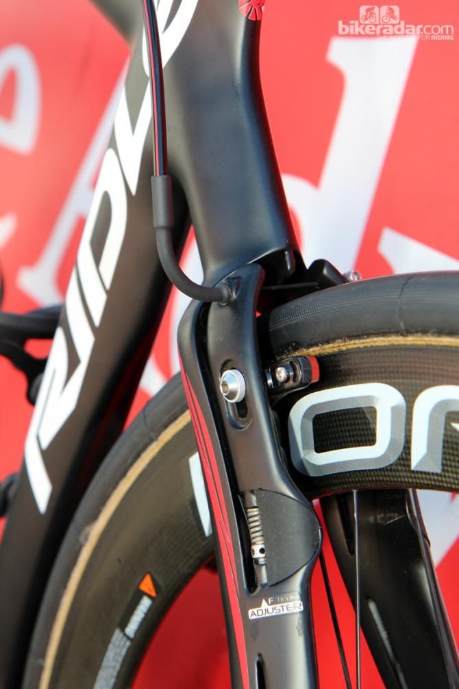 Lotto-Belisol's Ridley Noah FAST linear-pull brakes have a blended shape that is molded directly with the frame itself. The stainless steel cable noodle is dressed up with a bit of heat-shrink tubing to match the rest of the bike.