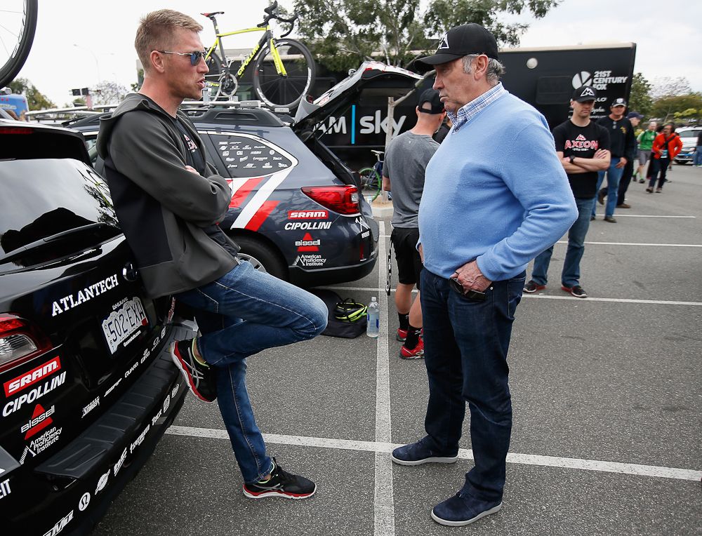 Axel and Eddy Merckx talk before the start of the final stage in downtown Lo Angeles.
