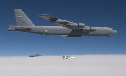 A B-52 releases a test version of the Massive Ordinance Penetrator