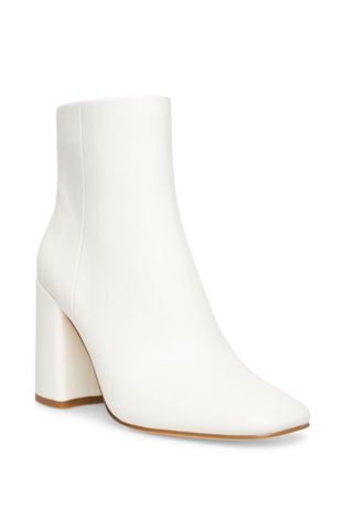 white heeled ankle boots